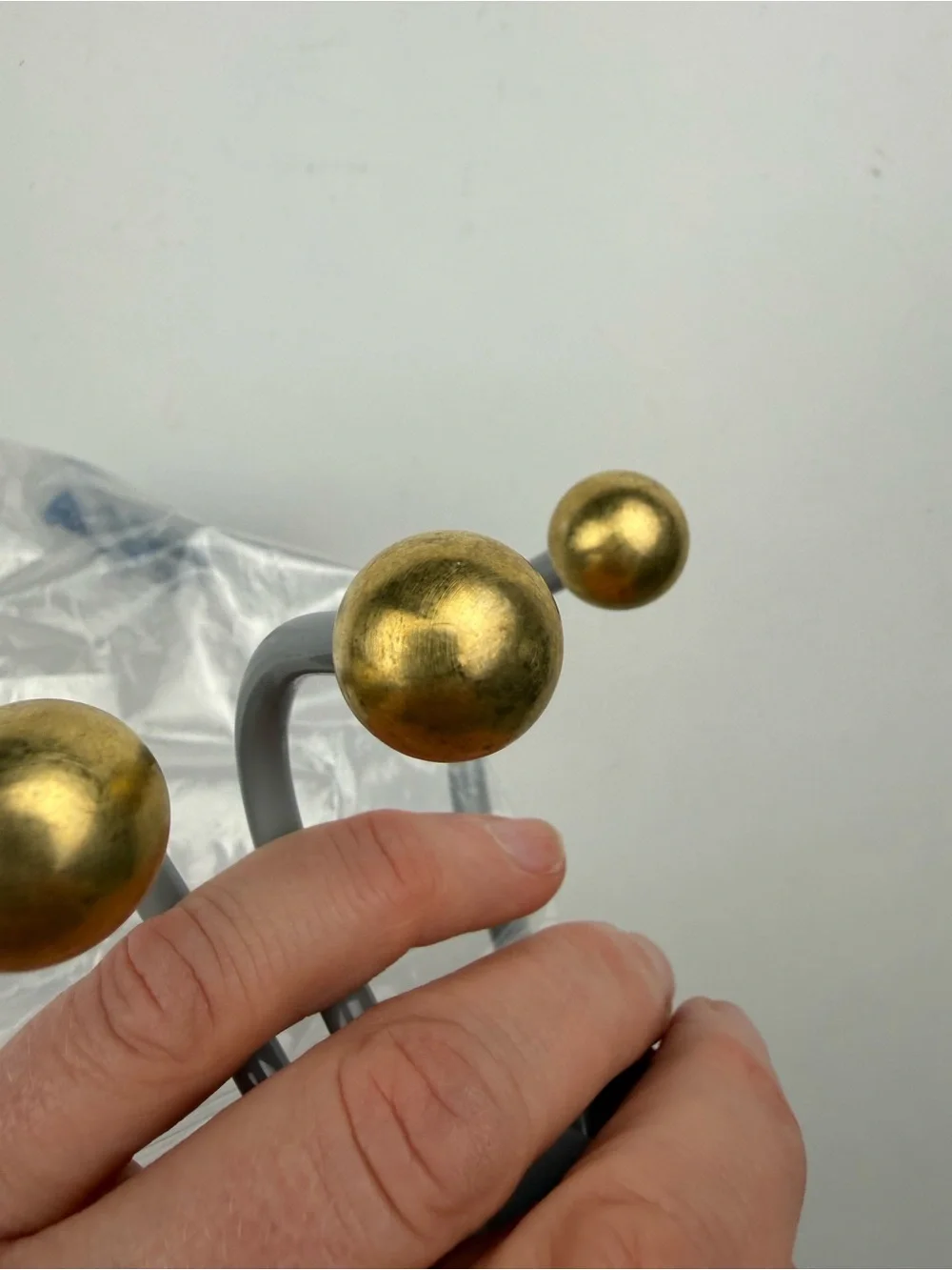 3 West Elm MCM coat hooks - gray with gold balls